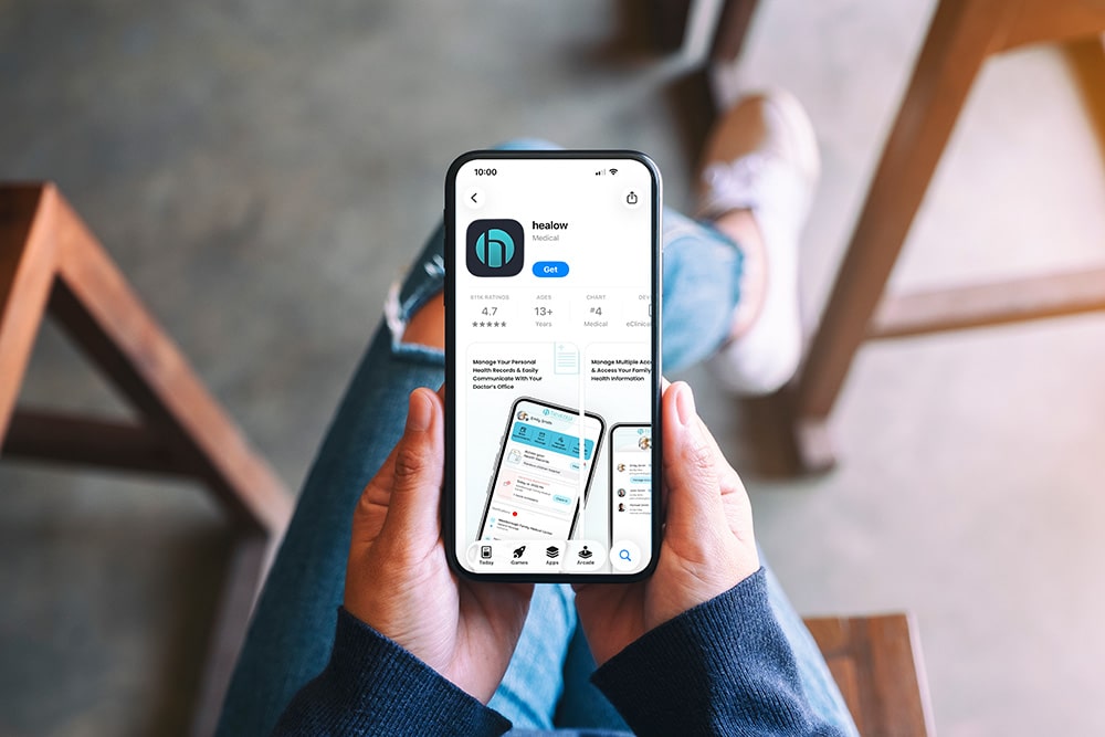 Patient using the healow mobile app to access heart and vascular care resources from Oracle Heart and Vascular in the Fredericksburg area of Virginia.