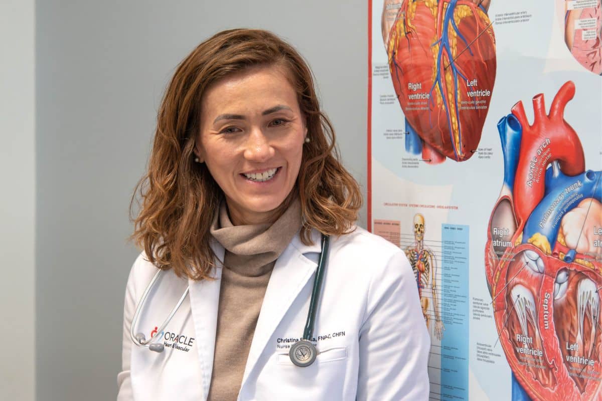 oracle-heart-and-vascular-womens-heart-health Female cardiologist smiling during women’s heart health visit at Oracle Heart and Vascular