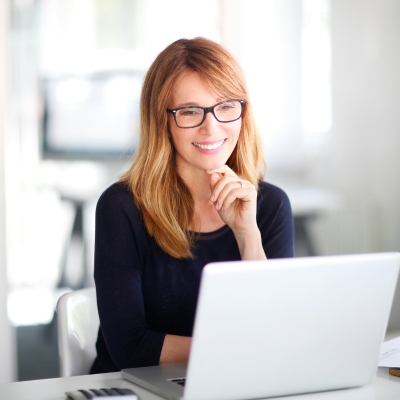 Woman working on a laptop, representing Oracle Heart and Vasculars New Website