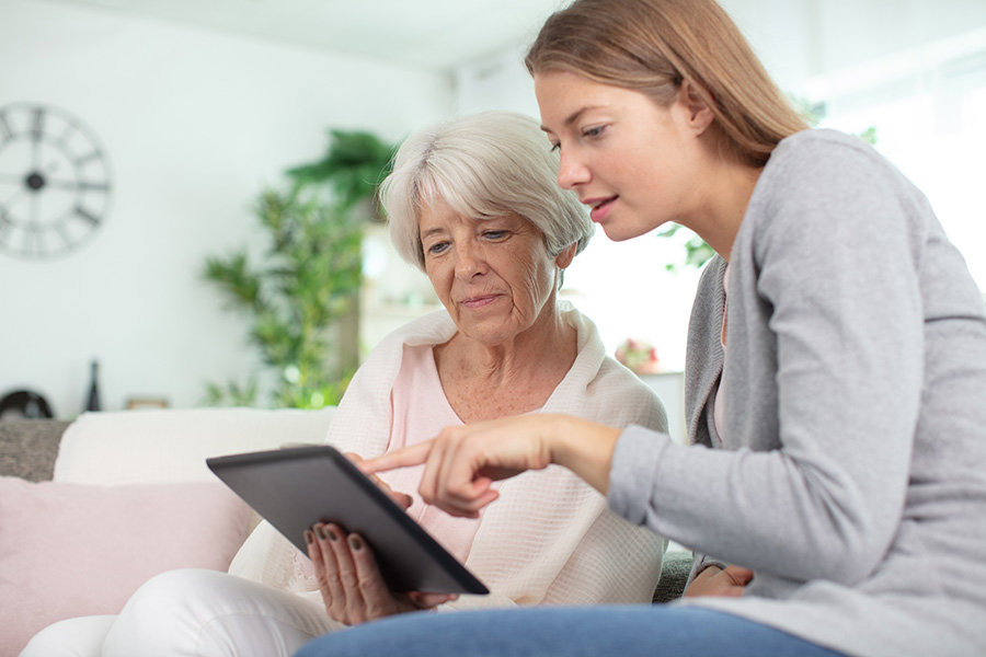 Heart & Vascular Patient FAQs | Oracle Heart & Vascular Fredericksburg VA Patient reviewing cardiovascular care information with a specialist during a consultation at Oracle Heart & Vascular serving Fredericksburg and King George VA
